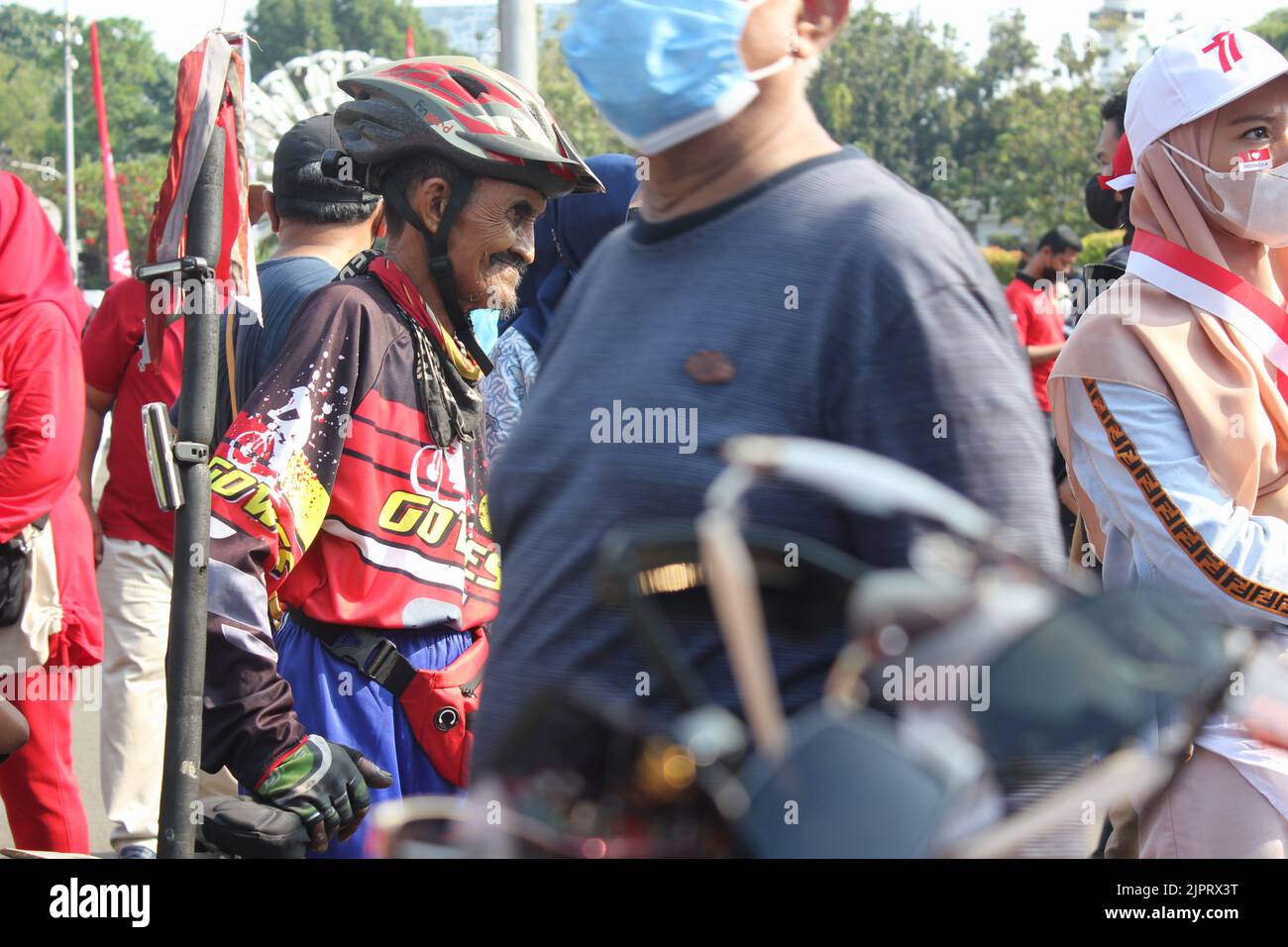 Jakarta, Indonesia, 17/08/2022 - Cyclists gathered in front of State Palace In Order To Celebrate 77th Indonesian Independence Day Stock Photo