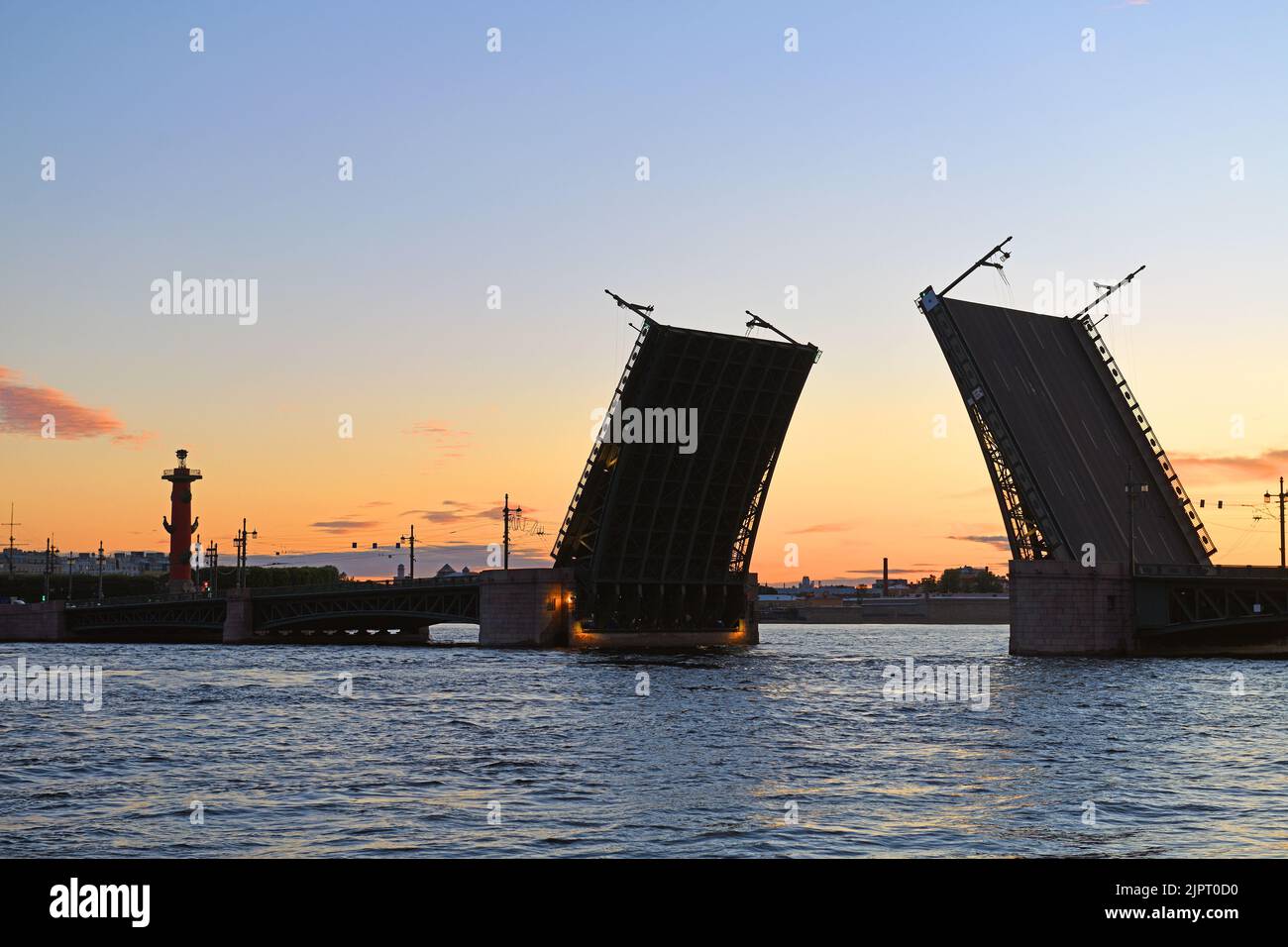 Palace Bridge, road- and foot-traffic bascule bridge, spans Neva River in Saint Petersburg at white night Stock Photo