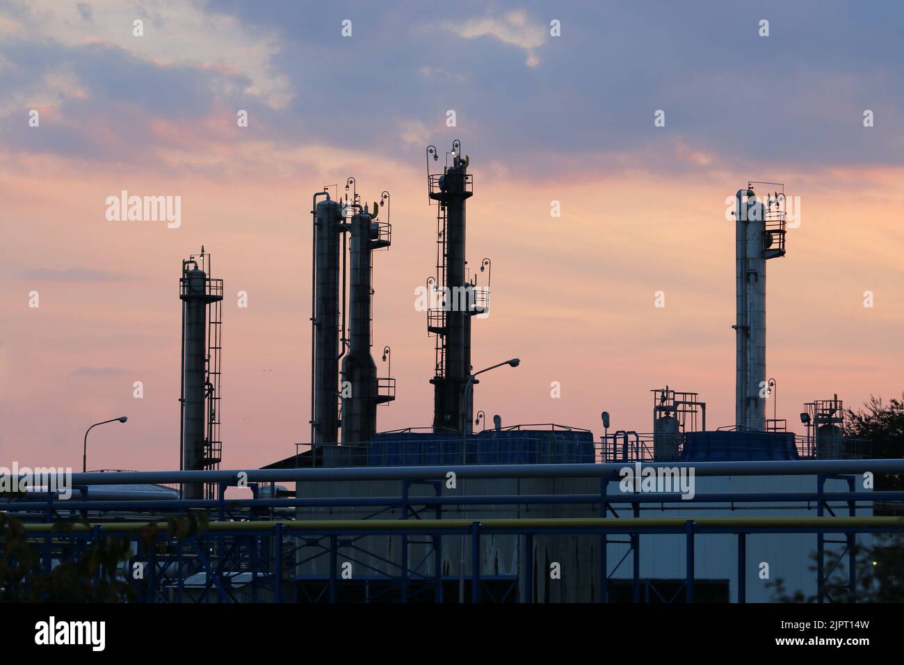 refinery oil and petrochemical industry sunset sky Stock Photo - Alamy