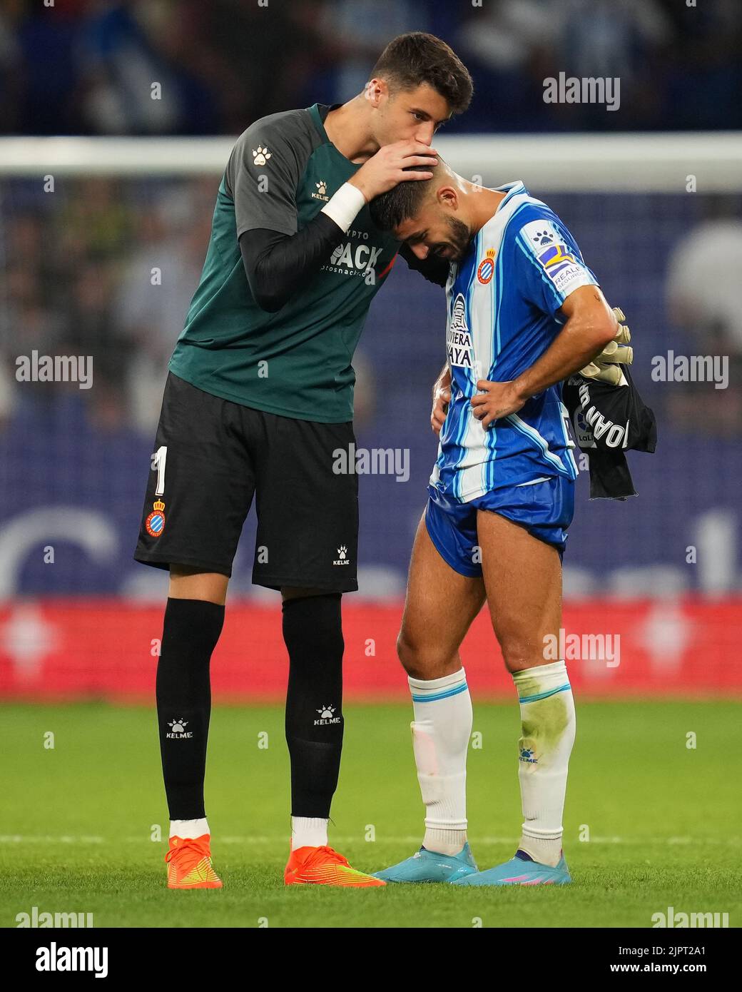 Joan Garcia of RCD Espanyol kisses his teammate Oscar Gil at full time during the La Liga match between RCD Espanyol and Rayo Vallecano played at RCDE Stadium on August 19, 2022 in Barcelona, Spain. (Photo by Bagu Blanco / PRESSIN) Stock Photo