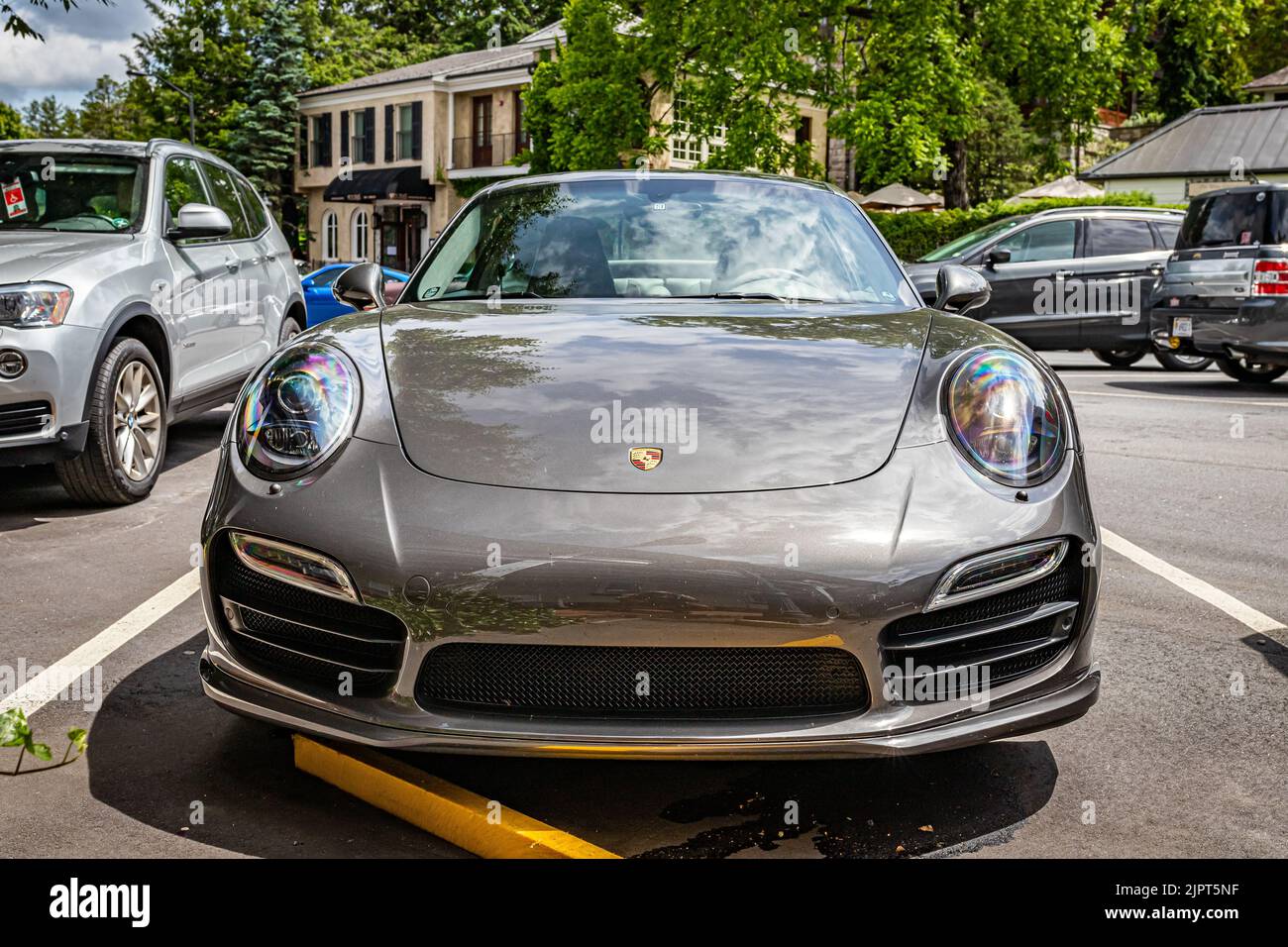 Highlands, NC June 10, 2022 Low perspective front view of a 2014 Porsche 911 Turbo S Coupe at