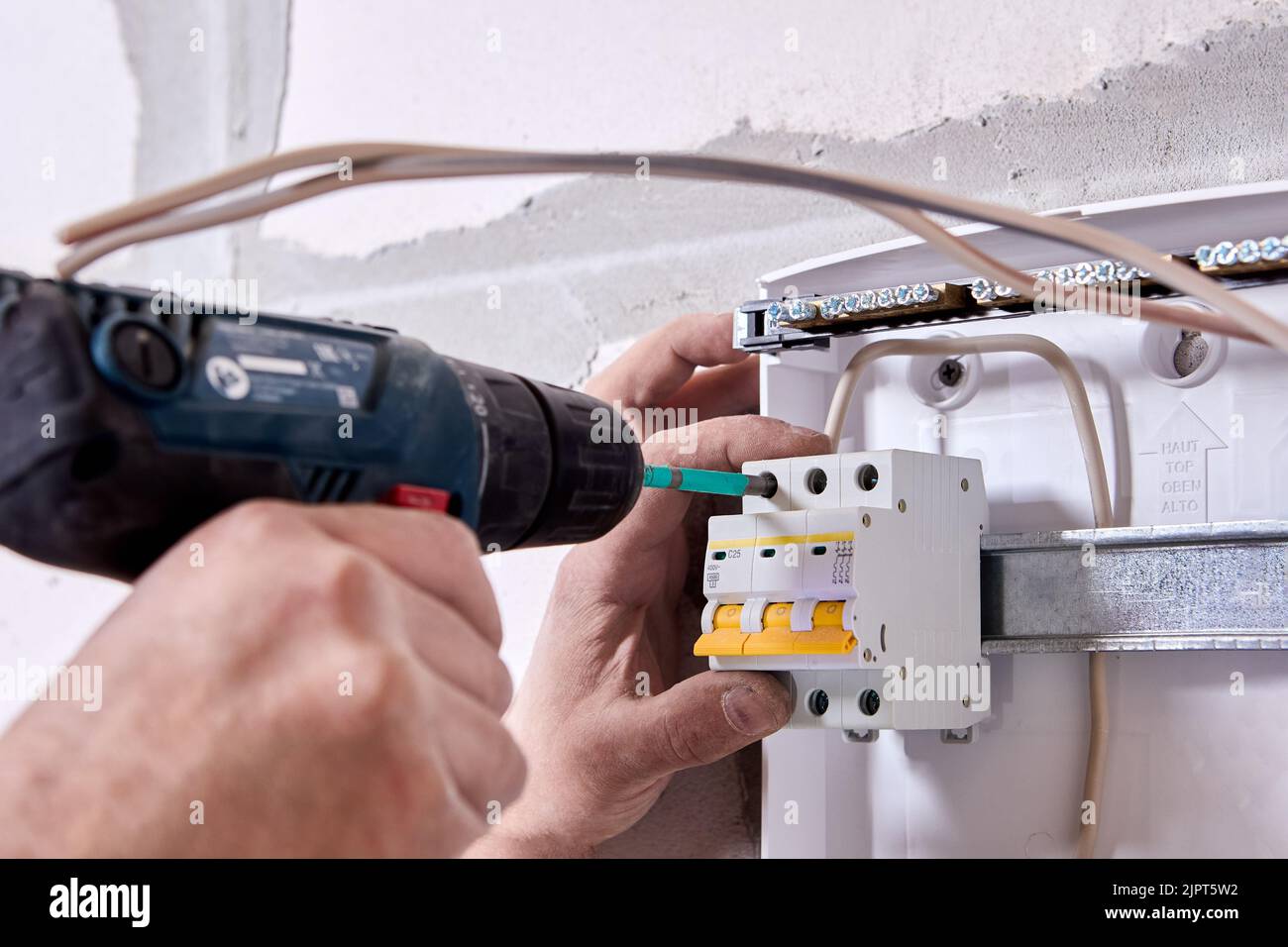 Mounting fuse box for distribution board. Fastening circuit breakers to