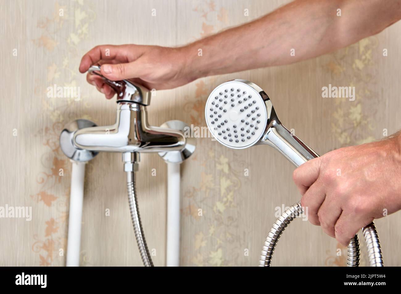 Plumber connected showerhead with flexible hose to single lever faucet