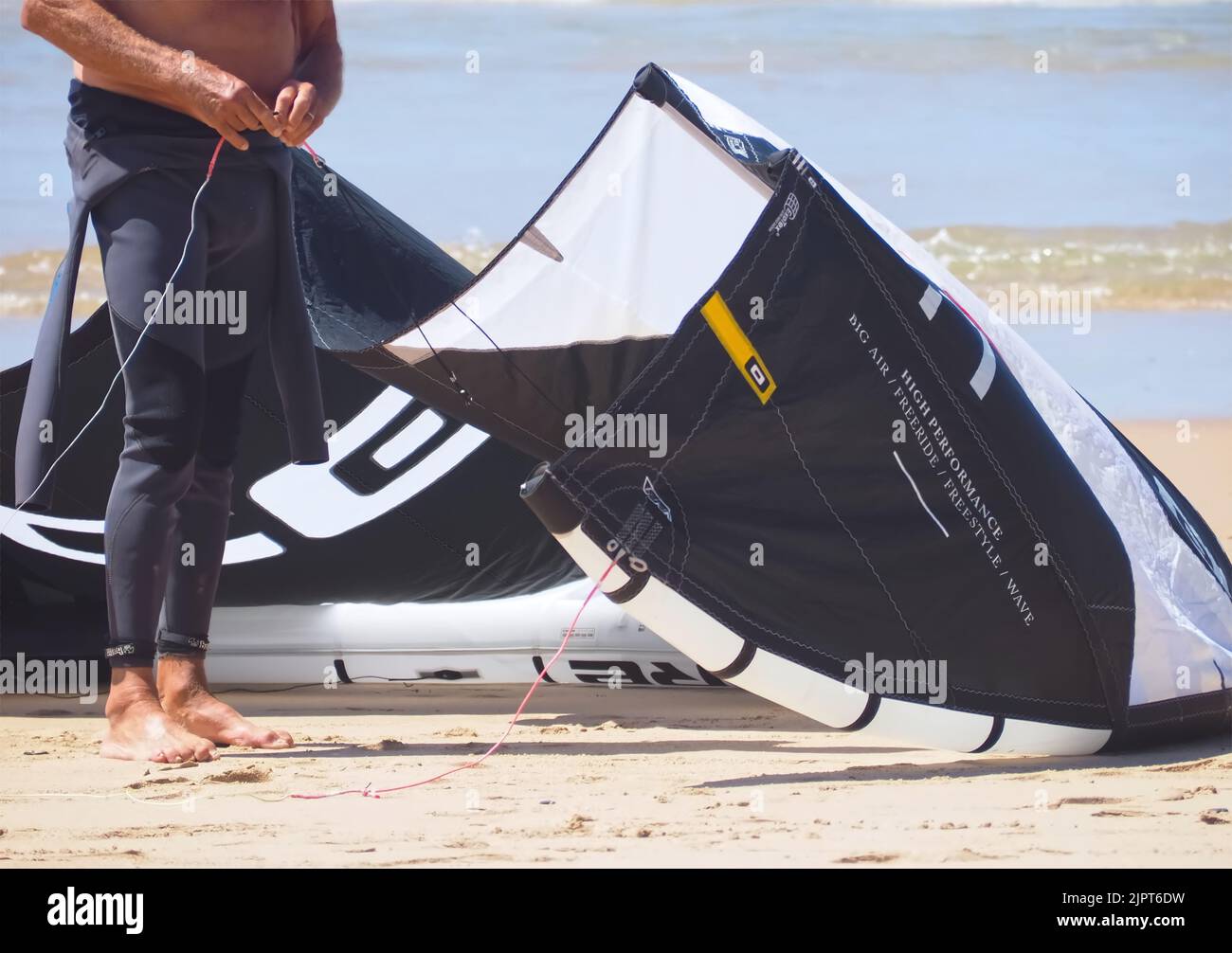 Core kite surfing umbrella in black and white at the beach Stock Photo