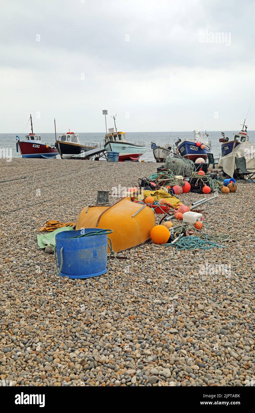 Beached boats and fishing gear Stock Photo