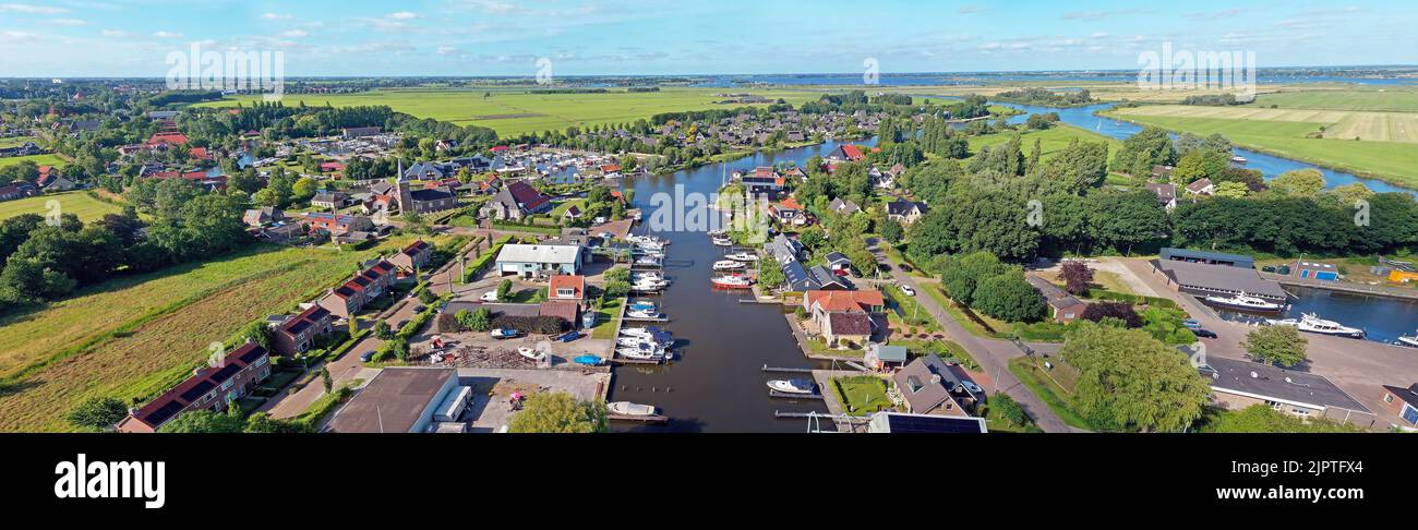 Aerial panorama from the little village Uitwellingerga in Friesland the Netherlands Stock Photo