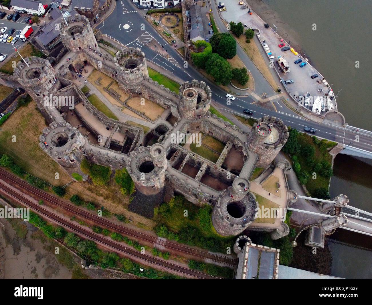 Aerial view of Conwy Castle in the town of Conwy in North Wales. It was built by Edward I, during his conquest of Wales, between 1283 and 1287. UNESCO Stock Photo