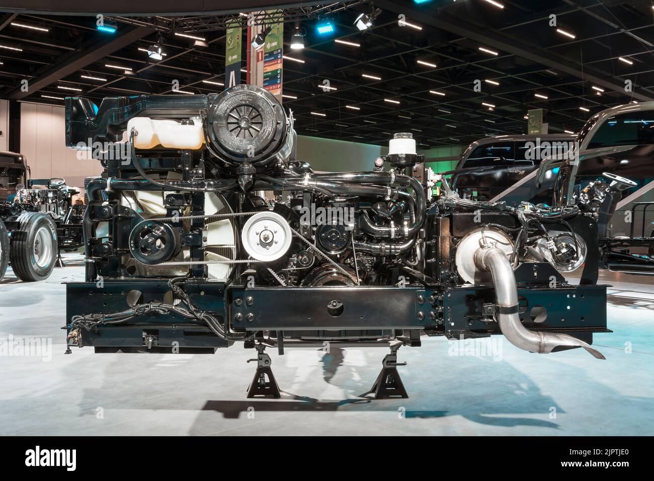 Exposed chassis, engine, gears and motor of a bus on display at the LAT ...
