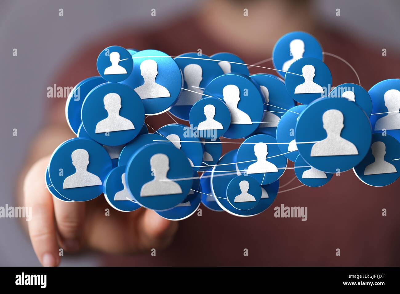 A man's hand pointing at 3d rendered profile icons Stock Photo - Alamy