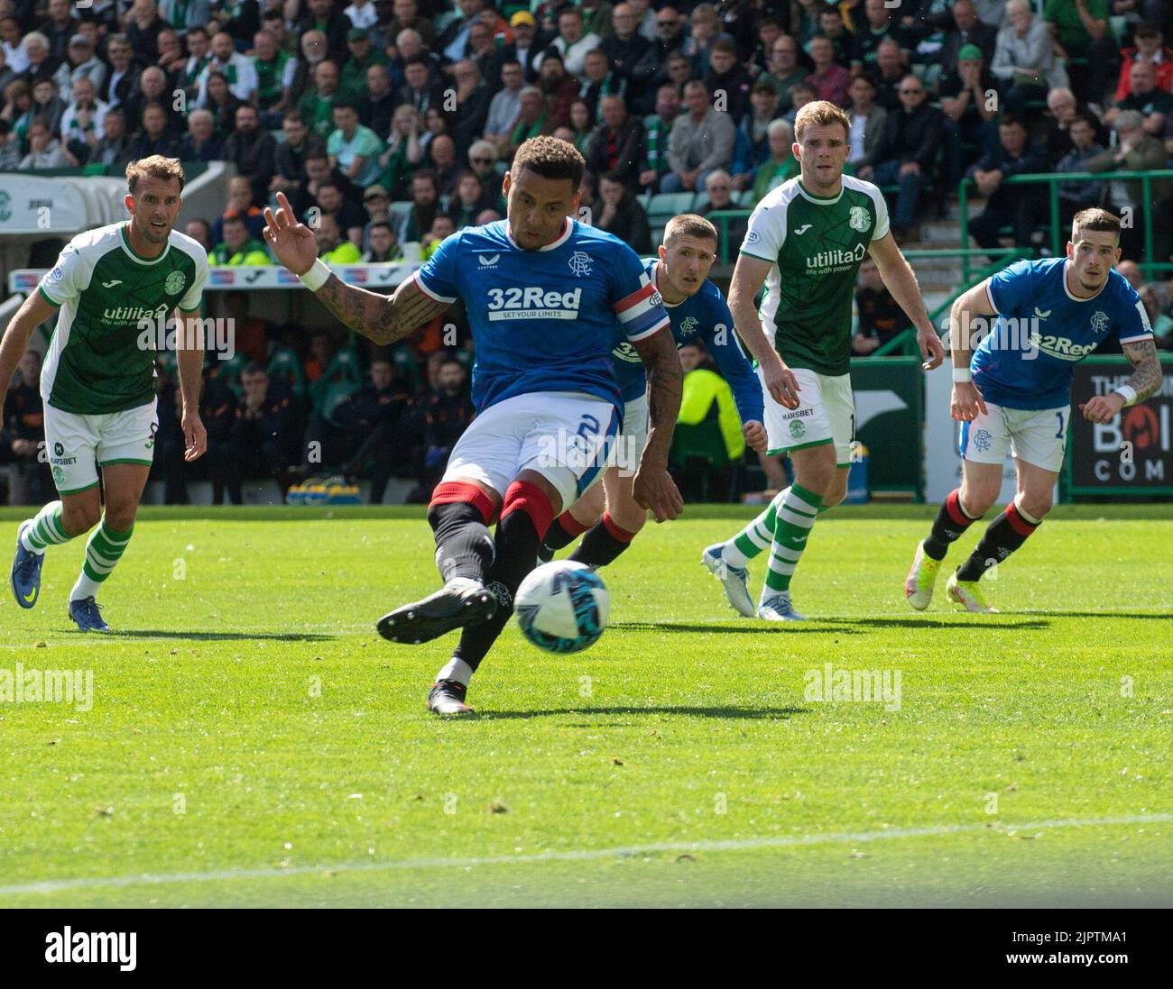 Edinburgh, UK. 20th Aug, 2022. Cinch Premiership - Hibernian v Rangers. 20/08/2022. Hibernian play host to Rangers in the cinch Premiership at Easter Road Stadium, Edinburgh, Midlothian, UK. Pic shows: Ranger's defender, James Tavernier, slots home in the 45th minute to put the visitors 1-0 in front. Credit: Ian Jacobs/Alamy Live News Stock Photo