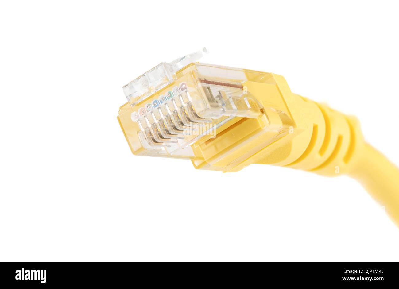 Macro shot of a yellow Ethernet cable for a LAN network connection with an RJ-45 network connection plug. White background, copy space. Stock Photo