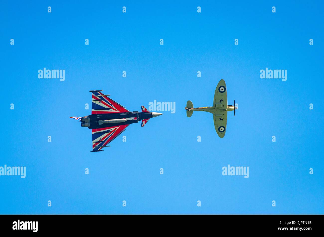 Eastbourne Airshow, East Sussex, UK, 20 Sep 2022. A World War Two Spitfire and a modern Typhoon