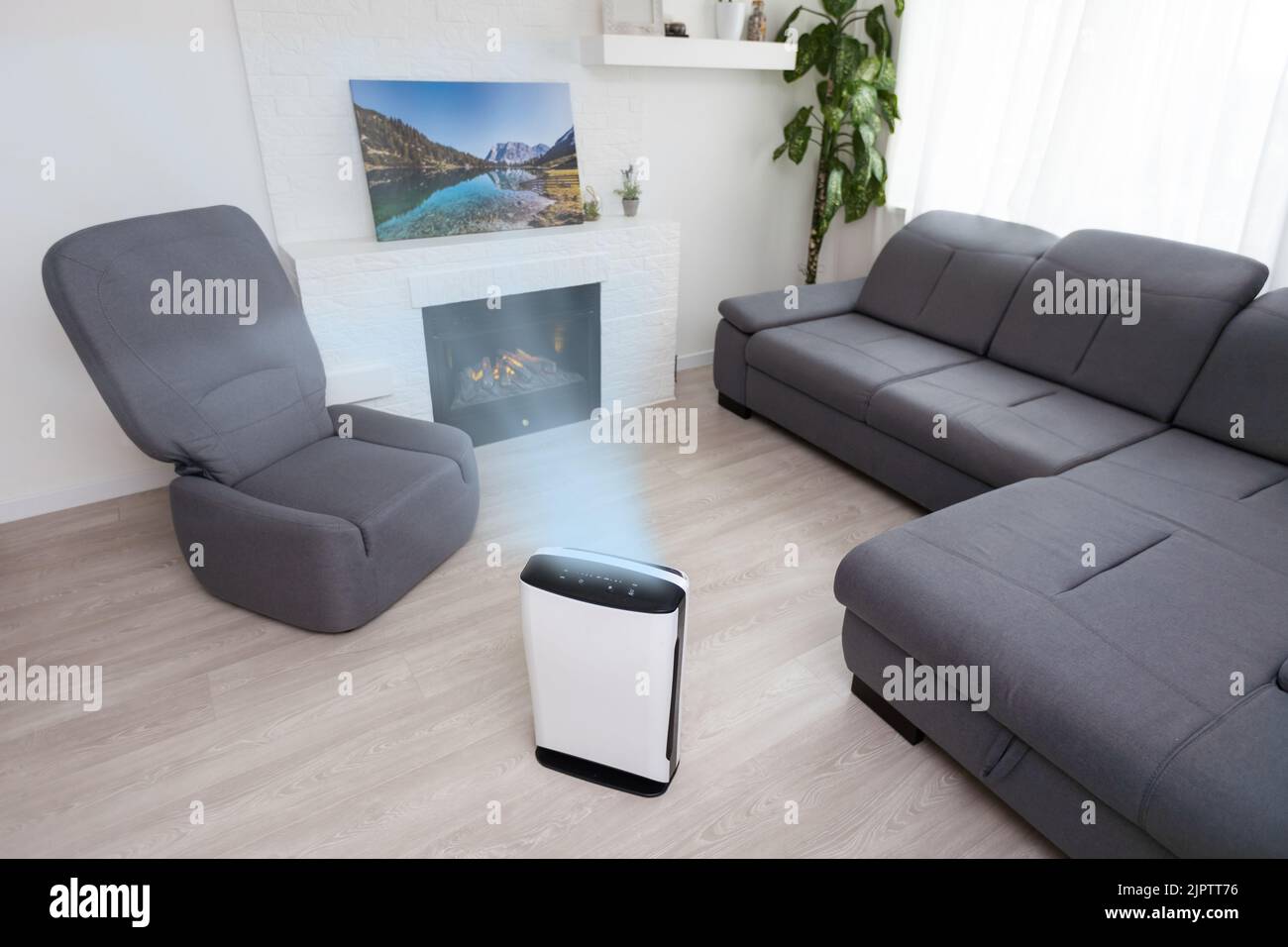 White Air purifier in living room for fresh air and healthy life. Copy ...
