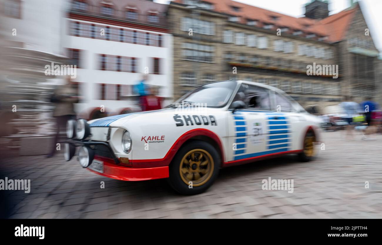 Chemnitz, Germany. 20th Aug, 2022. A Skoda 130 RS from 1976 rolls onto the market square in Chemnitz for the finale of the Sachsen Classic. Around 180 classic cars made their way from Oberwiesenthal to Chemnitz during the rally. The rally started in Zwickau on Thursday and also passed through the Czech Republic. The old cars had to cover a total of 582 kilometers. The Sachsen Classic went into its 19th edition this year. Vehicles from eight decades and about 30 different brands were on display. Credit: Hendrik Schmidt/dpa/Alamy Live News Stock Photo