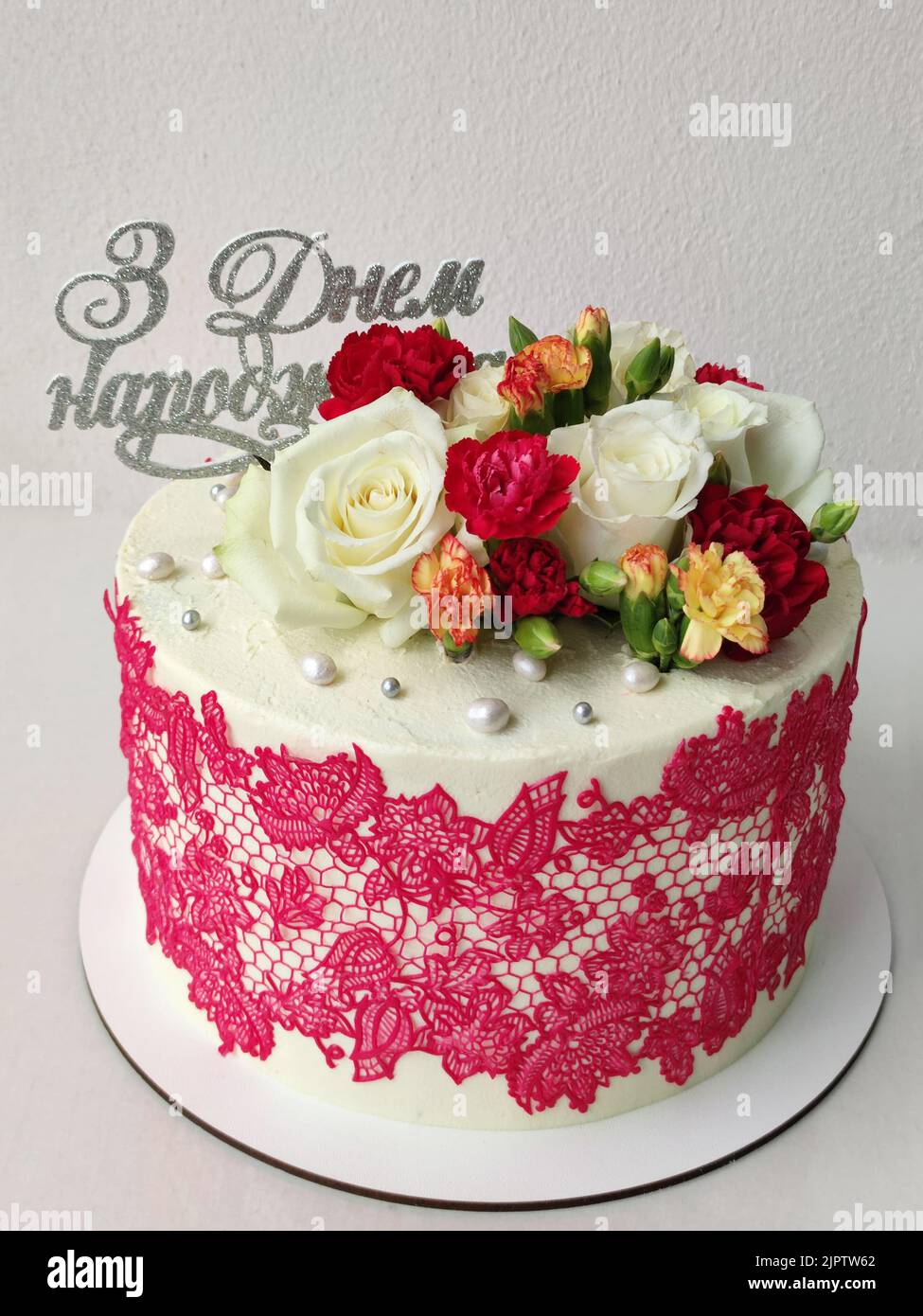 Sponge cream cake with lace and flowers Stock Photo Alamy