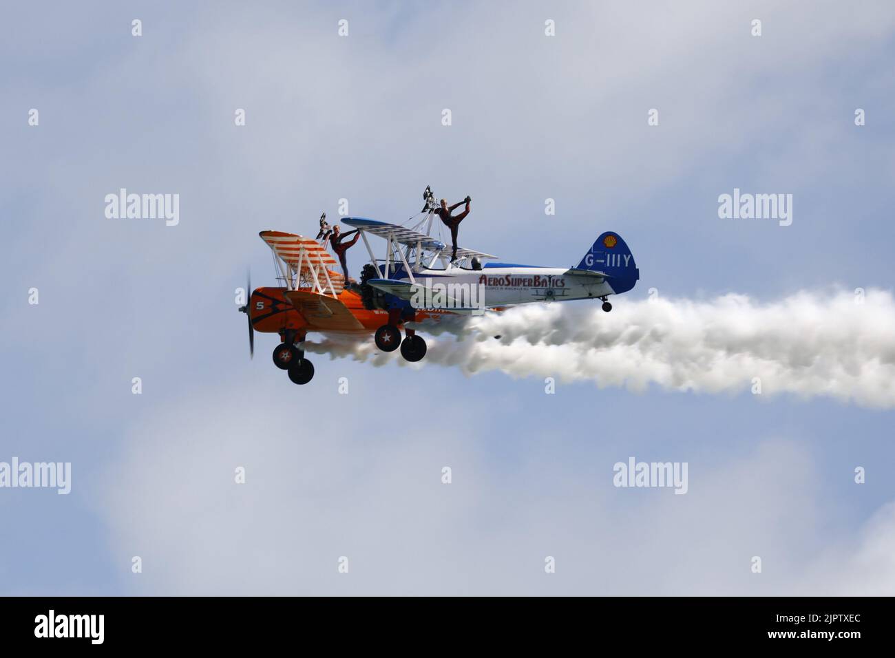 Eastbourne, UK.20th Aug 2022.Aerosupabatics wingwalkers entertain the crowds. Today see's the 3rd day of the Eastbourne airshow with aircraft flying their displays over the sea. Credit:Ed Brown/Alamy Live News Stock Photo