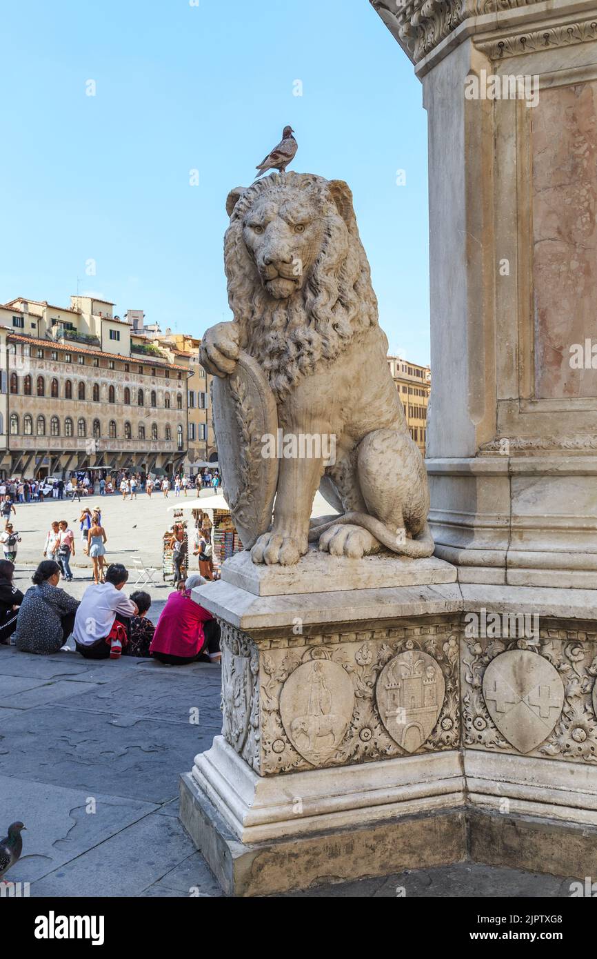 FLORENCE, ITALY - SEPTEMBER 18, 2018: This is one of the stone lions on the pedestal of the Dante monument. Stock Photo