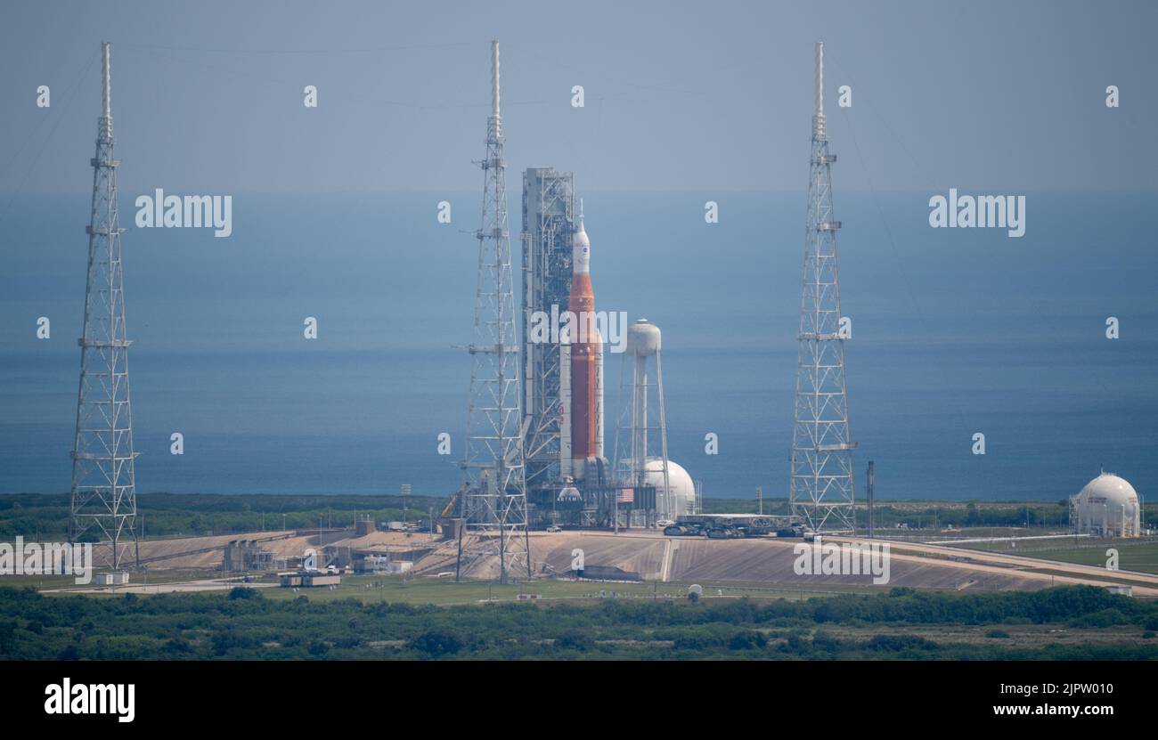 The NASA Space Launch System rocket with the Orion spacecraft arrives at Launch Pad 39B after making the four-mile journey from the Vehicle Assembly Building atop a mobile launcher, at the Kennedy Space Center, August 17, 2022, in Cape Canaveral, Florida. The rollout is in preparation for the uncrewed flight test expected no earlier than August 29.  Credit: Joel Kowsky/U.S. Navy Photo/Alamy Live News Stock Photo