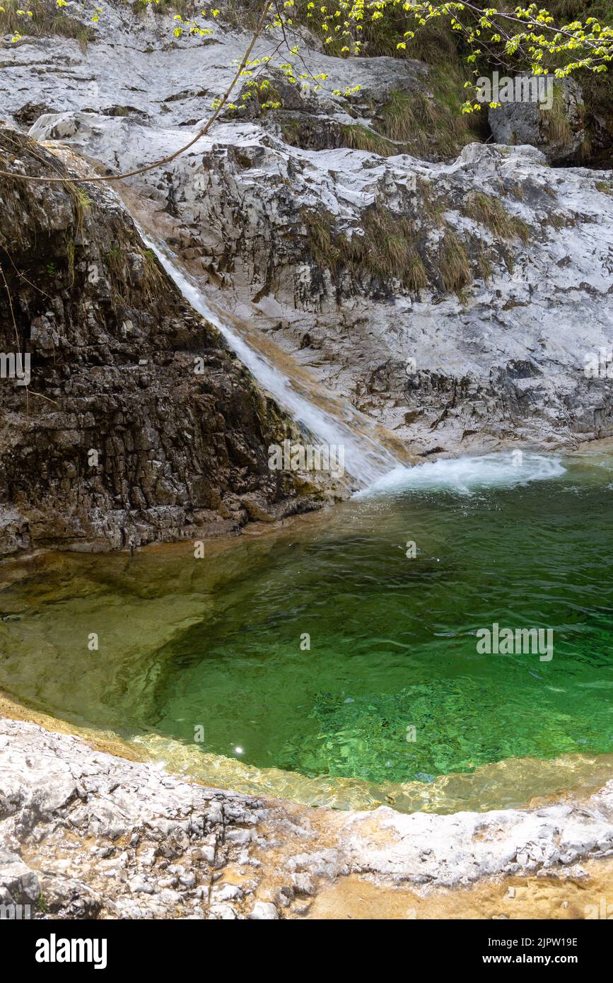 Spiro Waterfall Natural path of Val Falcina at Valle del Mis in Italy. Cadini of ...