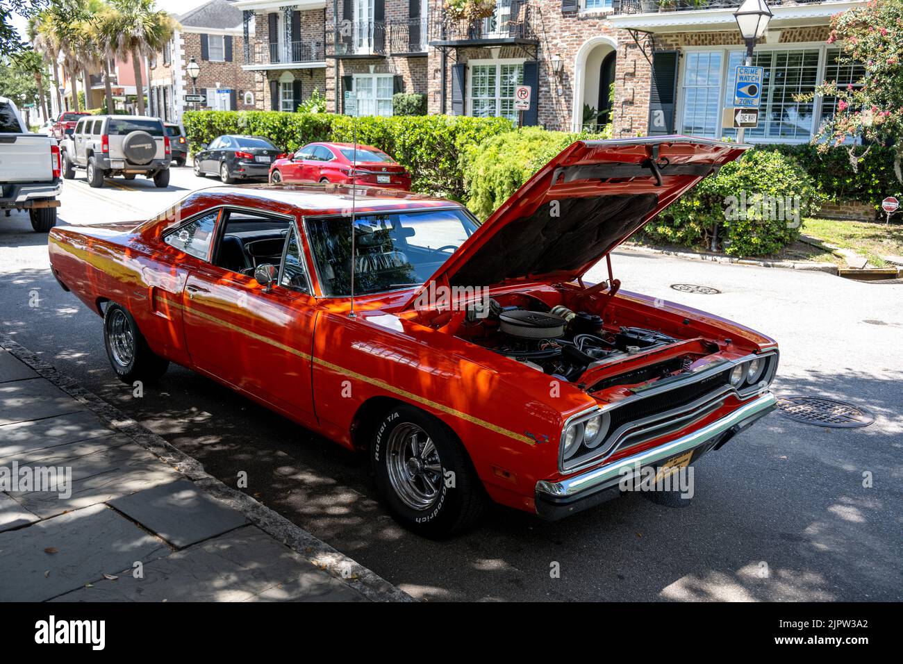 Charleston, SC - Aug 7 2022: An orange Plymouth Road Runner with an open hood Stock Photo