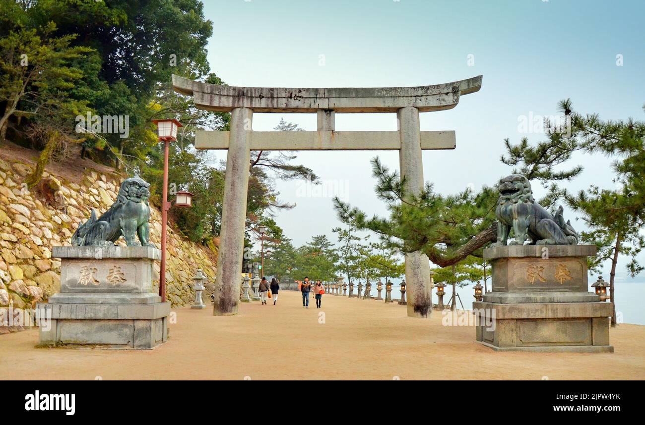 Komainu at itsukushima shrine hi-res stock photography and images