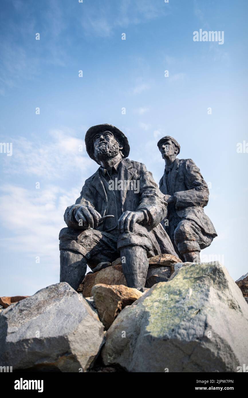 Bronze statue of mountaineering legends Norman Collie and John