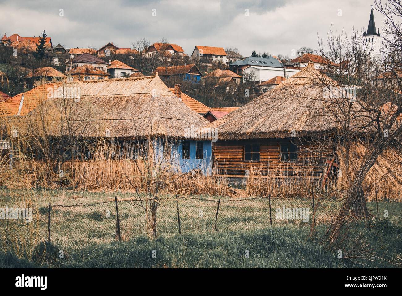 A rural area with old houses on a cloudy day Stock Photo - Alamy