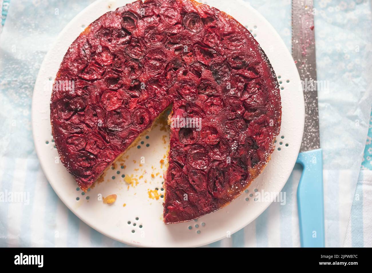 Cherry almond and honey upside down cake Stock Photo Alamy