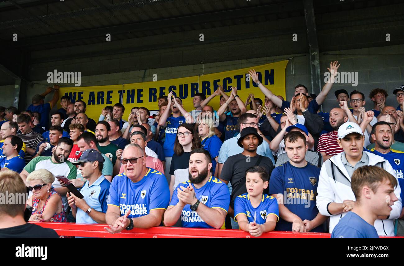 AFC Wimbledon fans during the EFL League Two match between Crawley Town and AFC Wimbledon at the Broadfield Stadium  , Crawley ,  UK - 20th August 2022 Editorial use only. No merchandising. For Football images FA and Premier League restrictions apply inc. no internet/mobile usage without FAPL license - for details contact Football Dataco Stock Photo