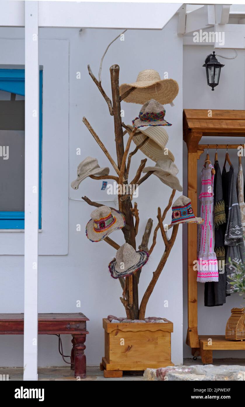 Pretty branched hat stand outside a shop. Tilos, Greece . Dodecanese. Stock Photo
