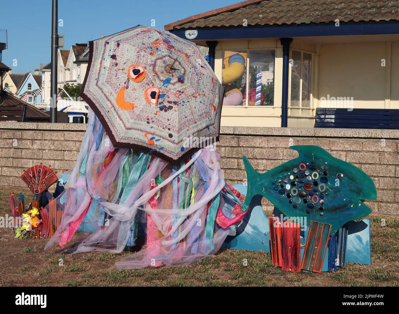 Recycled art along the seafront at Teignmouth, South Devon, using recycled materials to raise awareness of environmental issues. Stock Photo