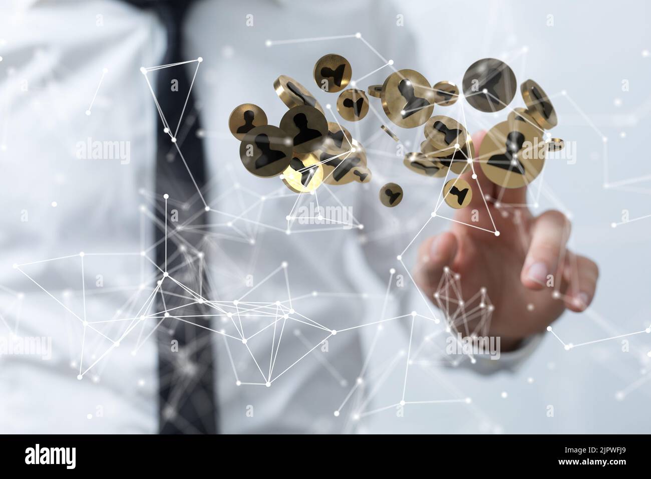 A male pointing at network icons - communication concept Stock Photo