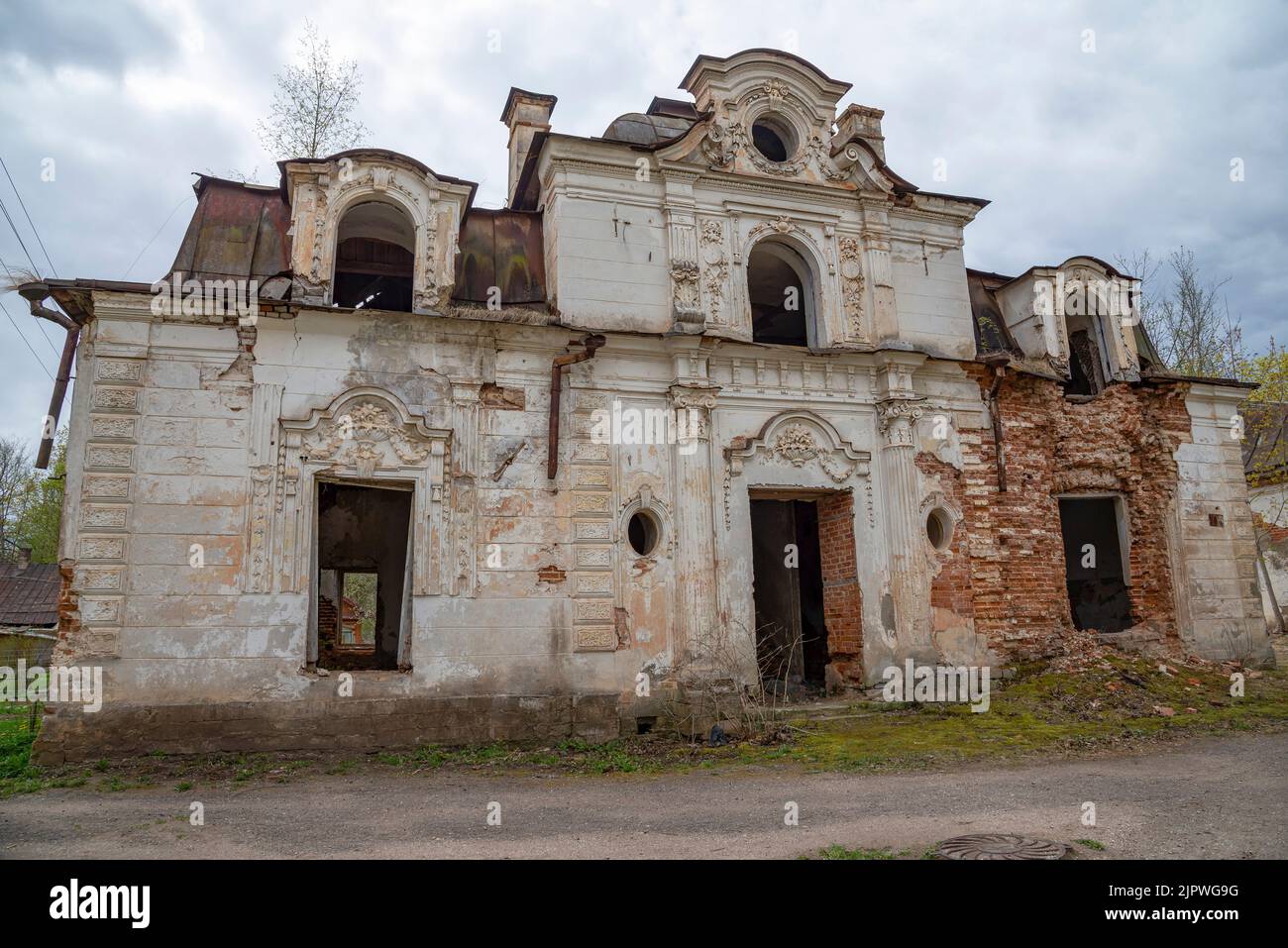 The ruins of the Countess house, later turned into a stud farm office. The estate of Count S.A. Stroganov. Pskov region, Porkhovsky district, Volyshov Stock Photo