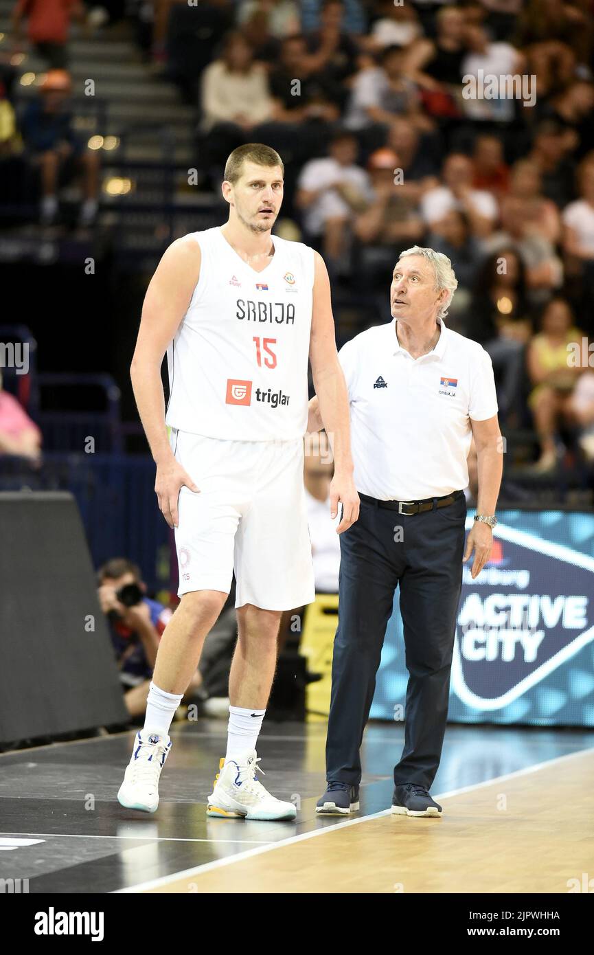 Hamburg, Germany. 20th Aug, 2022. Basketball: Supercup, Germany - Serbia, Final, Barclays Arena. Serbia's coach Svetislav Pesic (r) talks to Nikola Jokic. Credit: Michael Schwartz/dpa/Alamy Live News Stock Photo