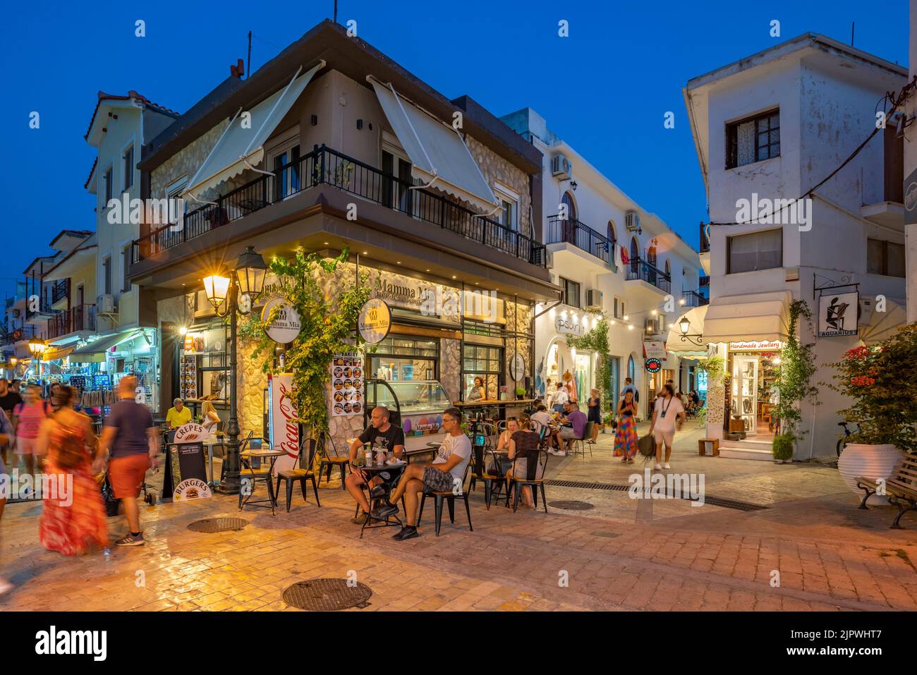 Busy street and nightlife in Skiathos Town, Skiathos Island, Sporades Islands, Greek Islands, Greece, Europe Stock Photo