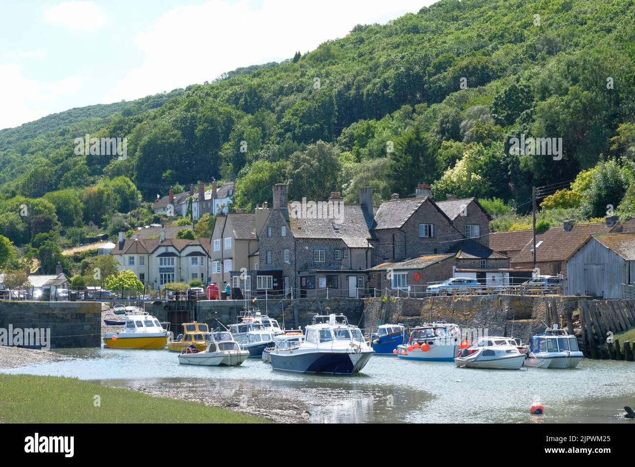 Porlock Weir, UK. Clear sunny day at the little harbour at Porlock Weir on the Somerset coast Stock Photo