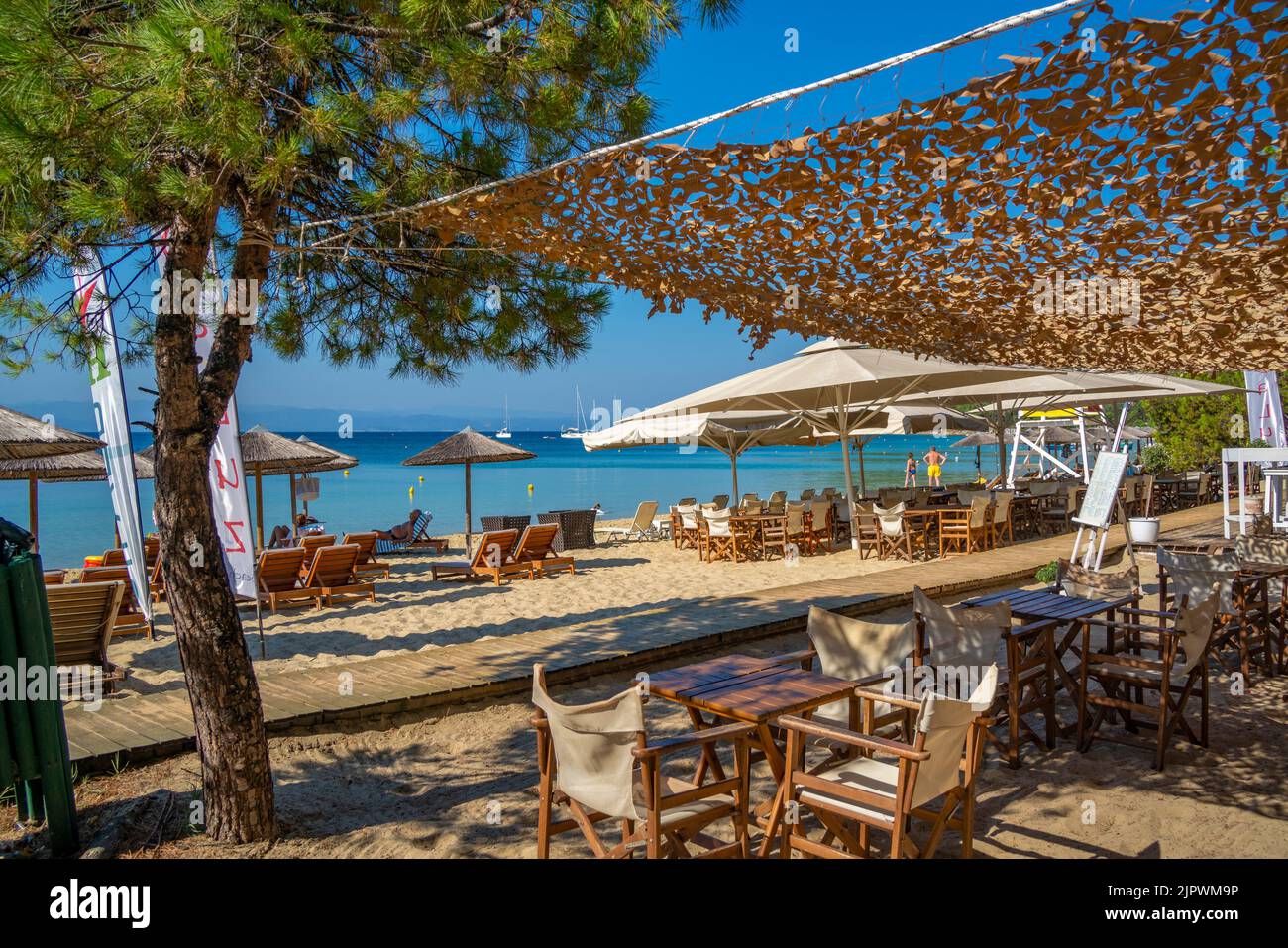 View of beach bar and cafe on Koukounaries Beach, Skiathos Town, Skiathos Island, Sporades Islands, Greek Islands, Greece, Europe Stock Photo