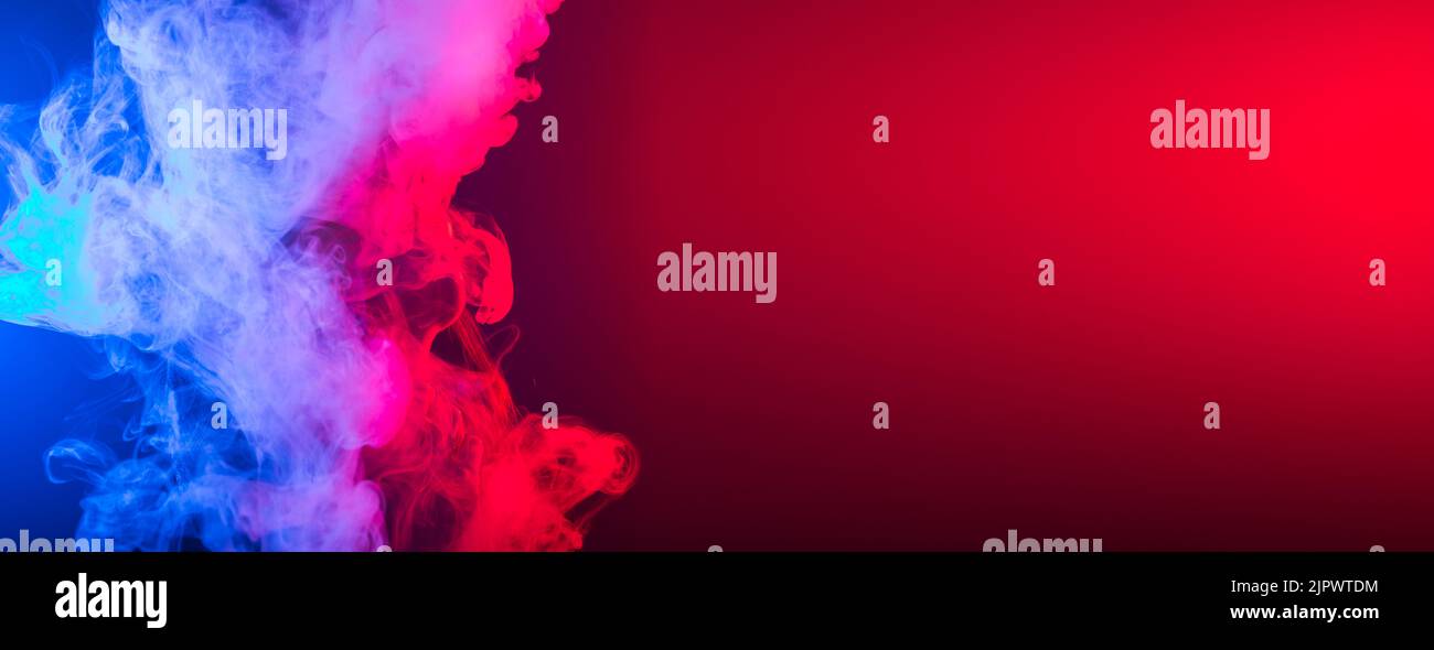 Banner smoke vape or e-cigarette in neon light at black background copy  space Stock Photo - Alamy