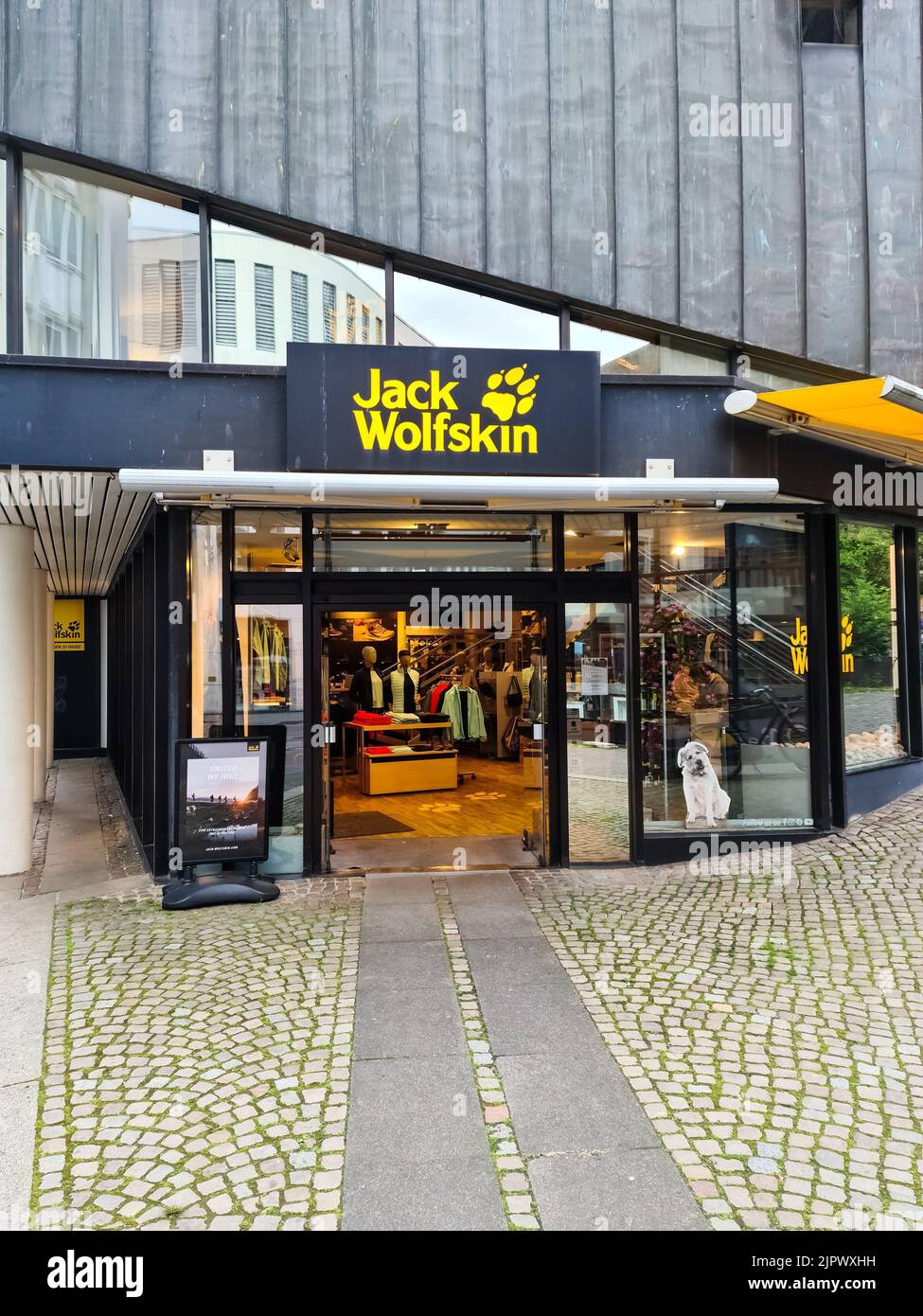 An entrance of an outdoor clothing shop of the Jack Wolfskin in Kiel, Germany Stock Photo