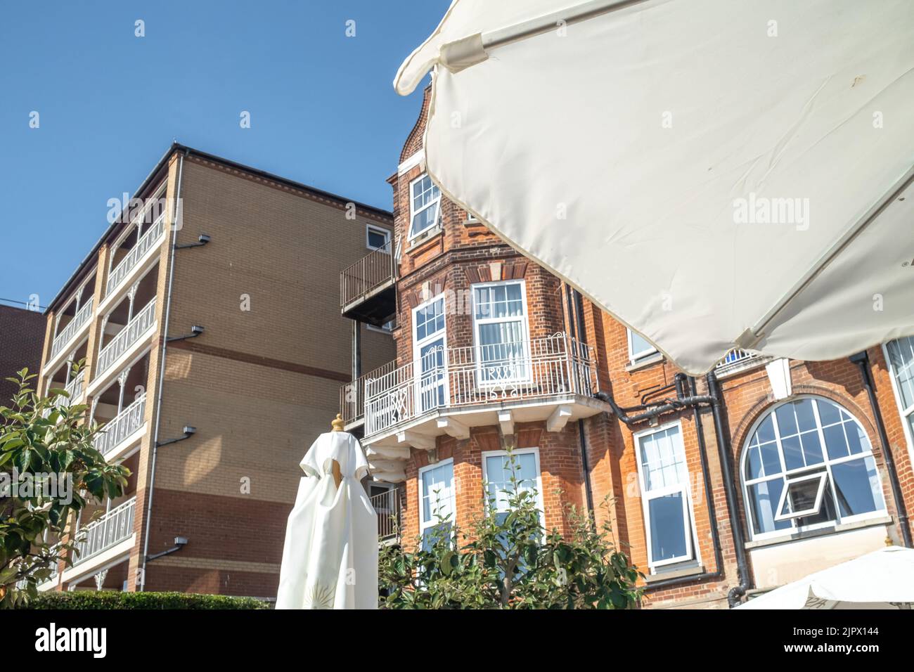 Lowestoft, Suffolk, UK August 14 2022. Outdoor wooden bench table and