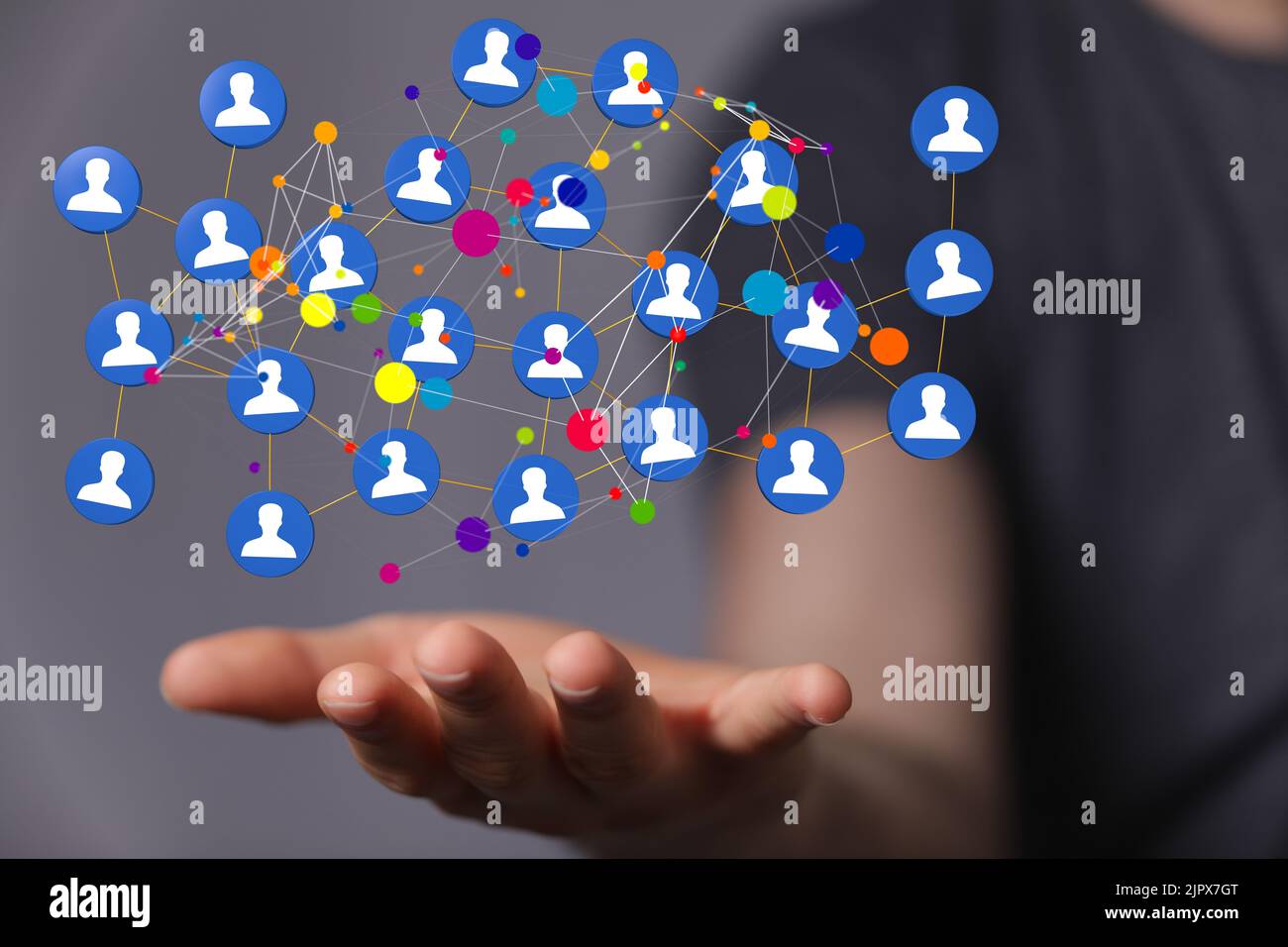 A 3D rendering of people icons floating in a person's hand Stock Photo ...
