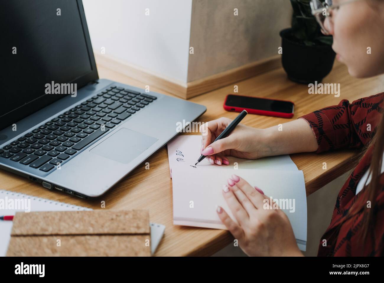 Taskmanager, To do List, Boosts Productivity, Close up of female hands ...