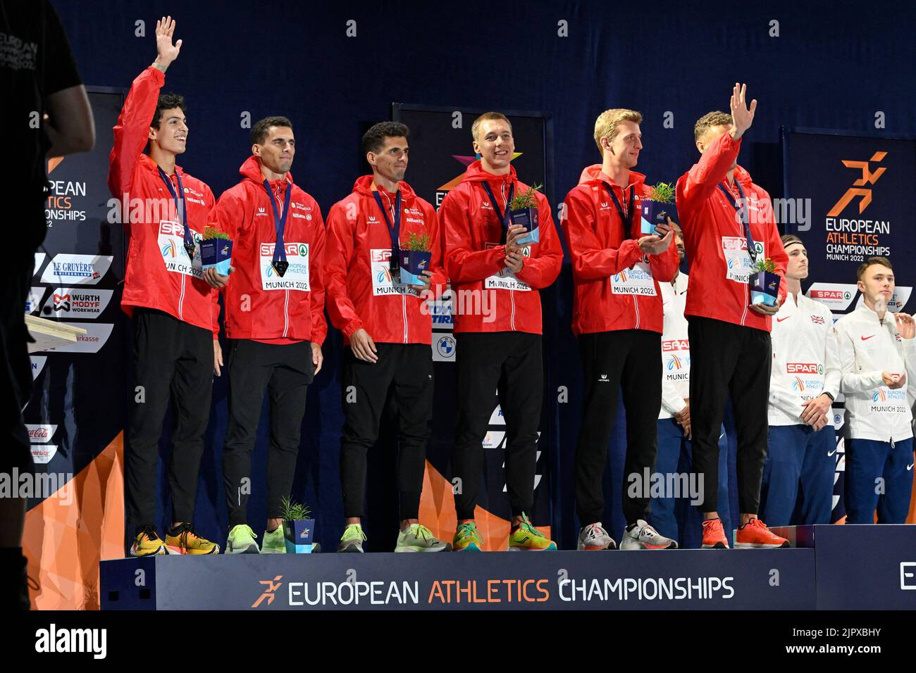 L-R, Belgian Jonathan Sacoor, Belgian Jonathan Borlee, Belgian Kevin Borlee, Belgian Julien Watrin, Belgian Alexander Doom and Belgian Dylan Borlee celebrate on the podium with their silver medal on the podium of the men's 4x400m relay race at the European Championships athletics, at Munich 2022, Germany, on Saturday 20 August 2022. The second edition of the European Championships takes place from 11 to 22 August and features nine sports.  BELGA PHOTO ERIC LALMAND Stock Photo