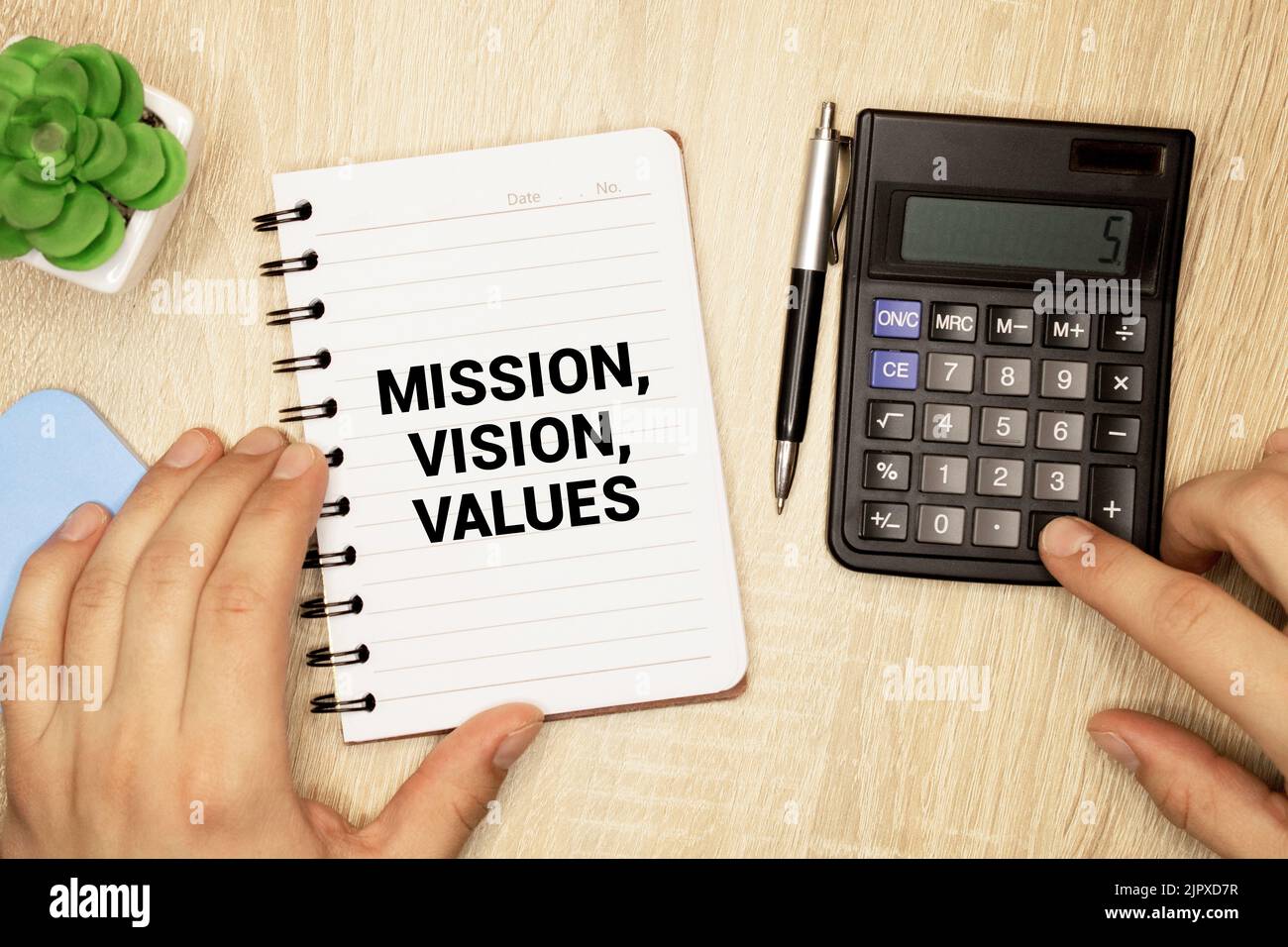 Vision Mission Values business concept on the note with some colorful ...