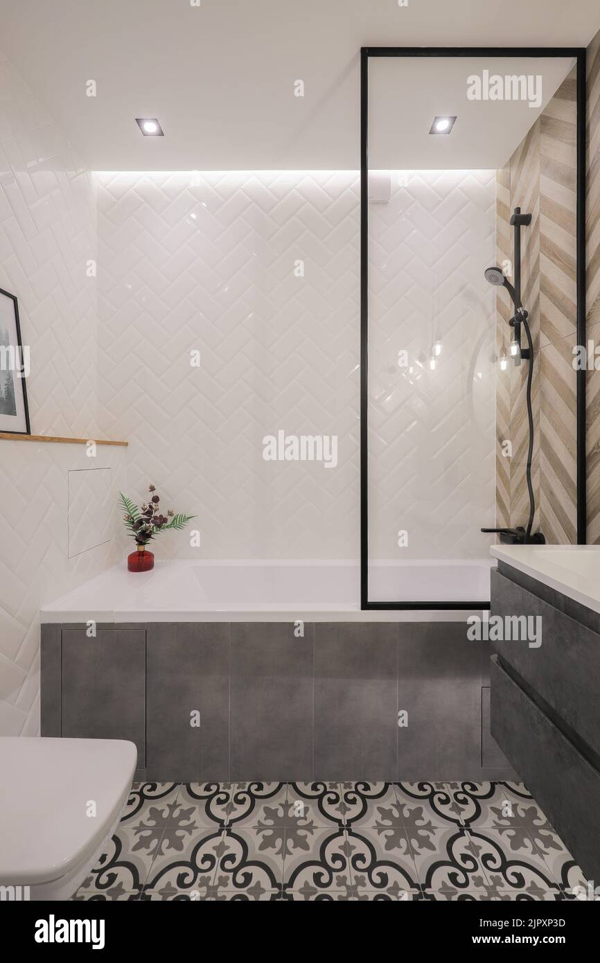 Bathroom interior with shower and white bathtub Stock Photo Alamy