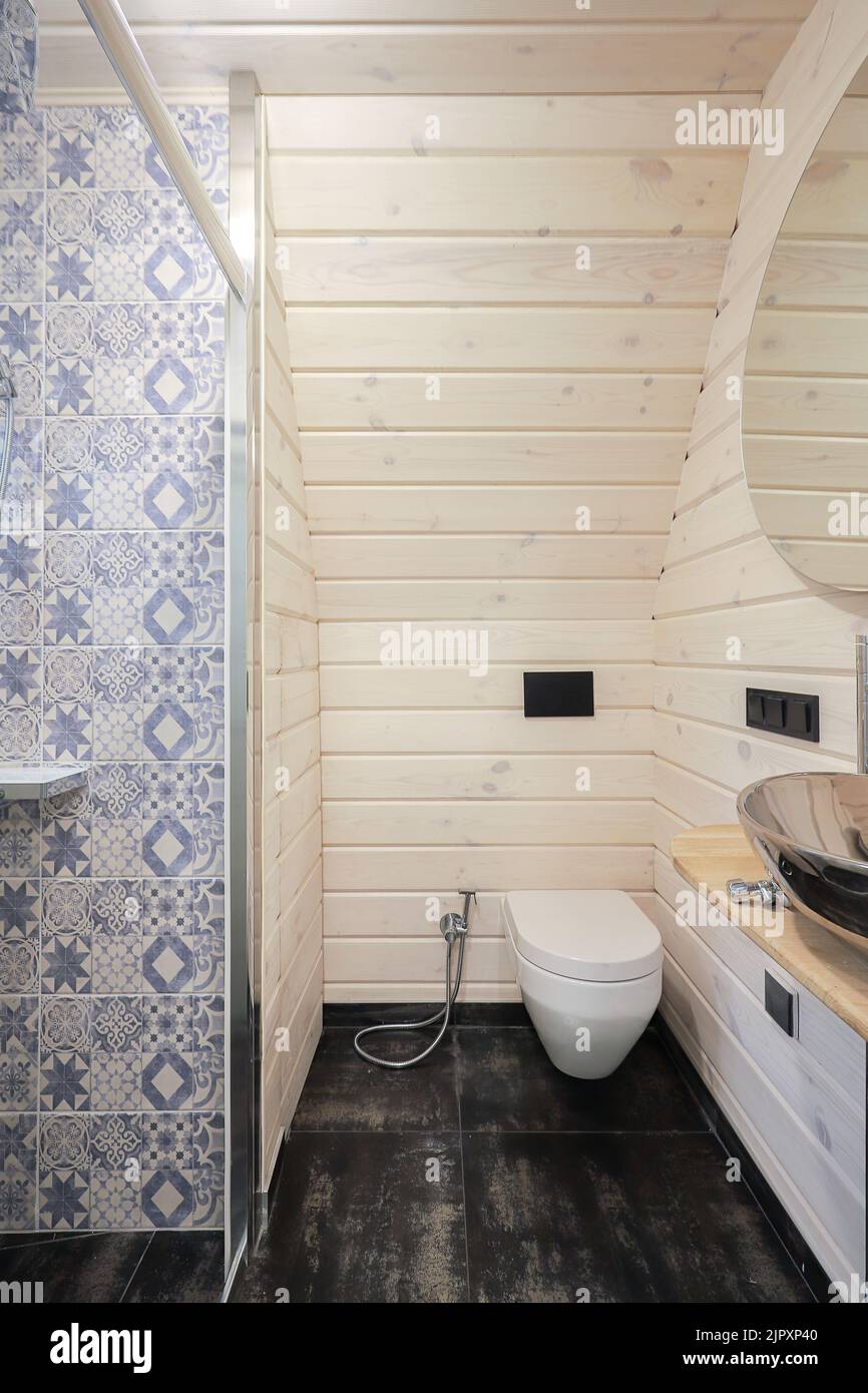 White toilet bowl in a bathroom interior Stock Photo - Alamy