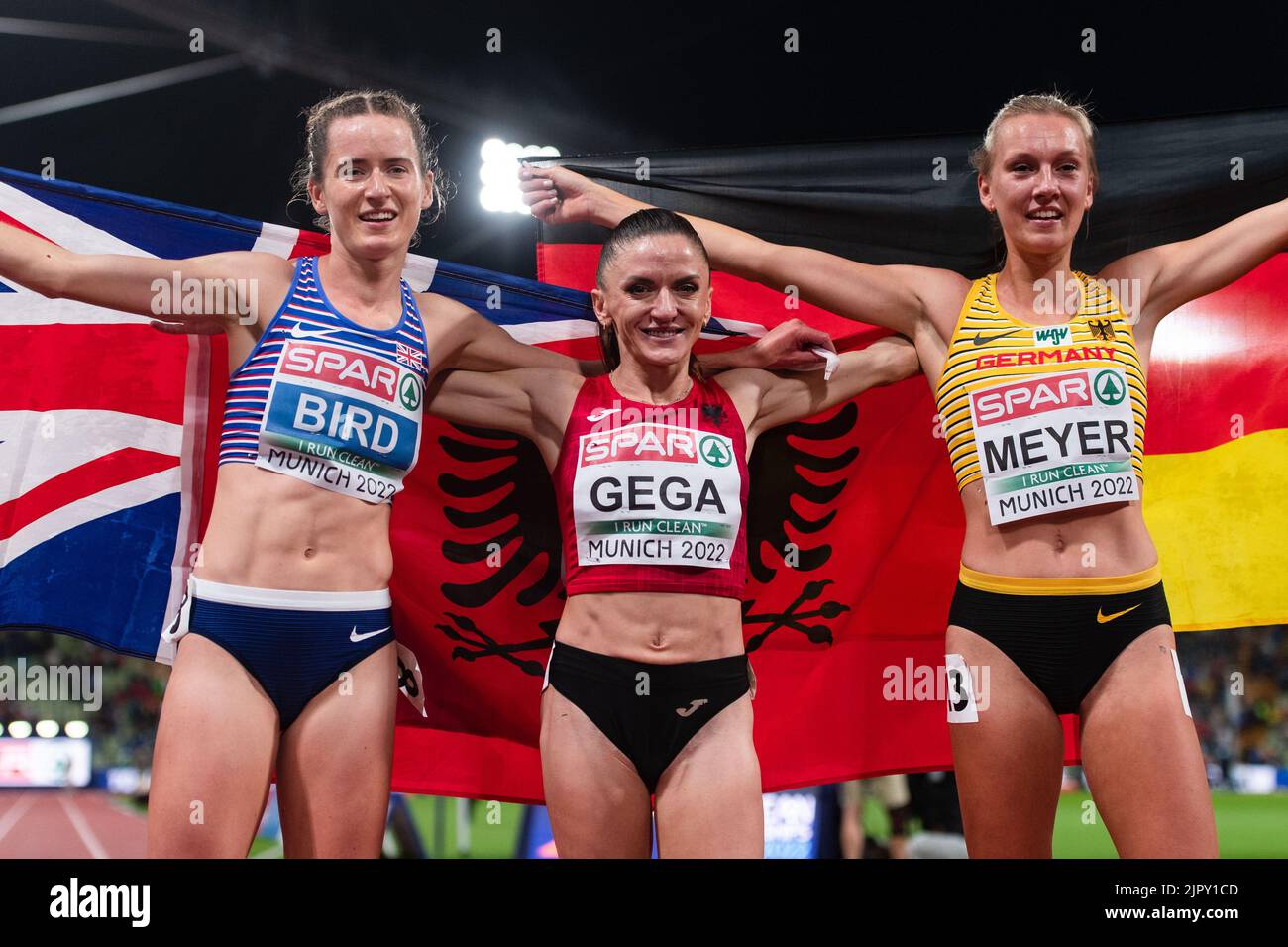 Albania's Luiza Gega (centre) celebrates winning the Women's 300m Steeplechase Final alongside Germany's Lea Meyer (right) who finished second and Great Britain's Elizabeth Bird who finished third during day ten of the European Championships 2022 in Munich, Germany. Picture date: Saturday August 20, 2022. Stock Photo