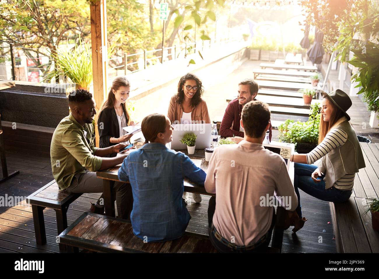 Turning their local cafe into their own boardroom. a group of designers ...