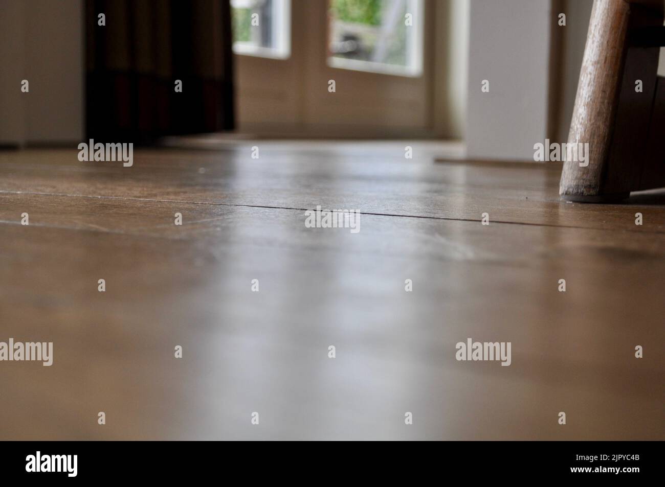  An artsy view of light on the floor at ground level with a bokeh style ...