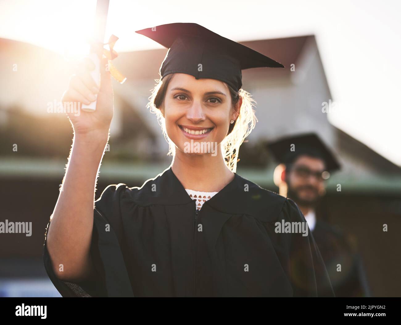 Its official Im qualified. Portrait of a happy young woman holding a ...